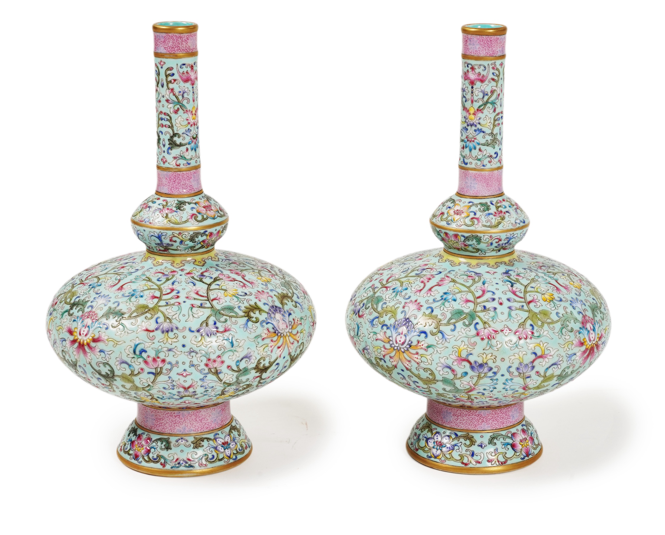 A pair of Chinese famille rose enamelled porcelain bottle vases, Qianlong seal mark to base but Republic Period